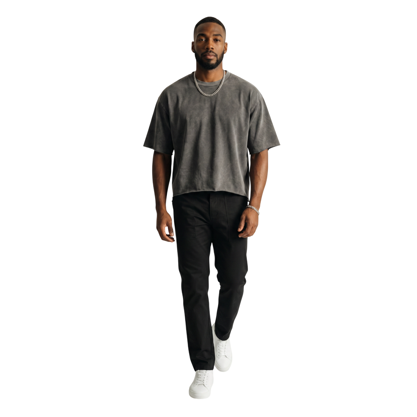NILO Director snow-washed grey boxy t-shirt with raw edges worn by a man with a silver chain