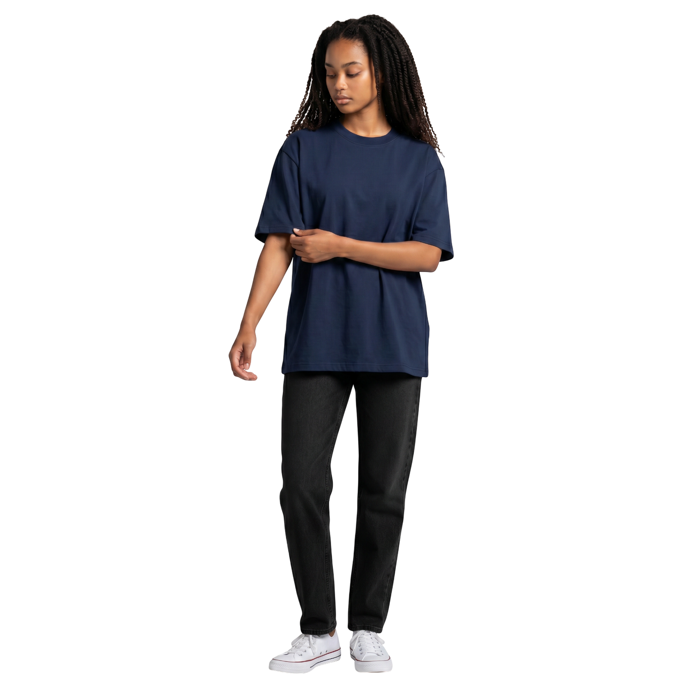 NILO Frame Loose Tee in navy blue cotton with drop shoulders worn by a woman with black jeans and white sneakers