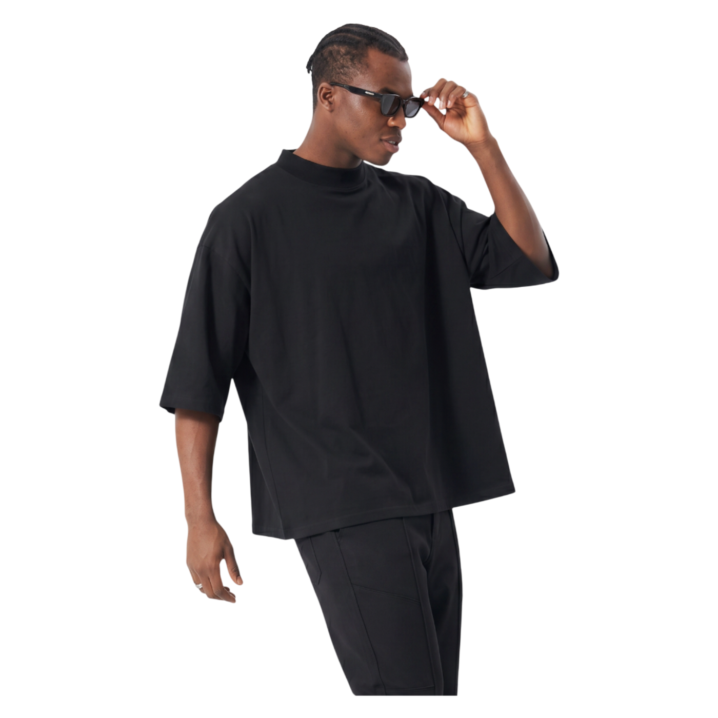 NILO Vision oversized boxy black heavyweight cotton t-shirt worn by a man with sunglasses and white sneakers