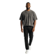 NILO Director snow-washed grey boxy t-shirt with raw edges worn by a man with a silver chain