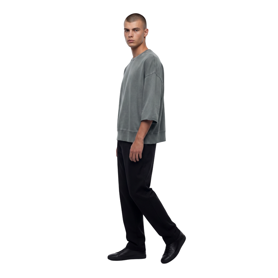 NILO Master heavyweight oversized grey cotton t-shirt worn by a male model against a black background