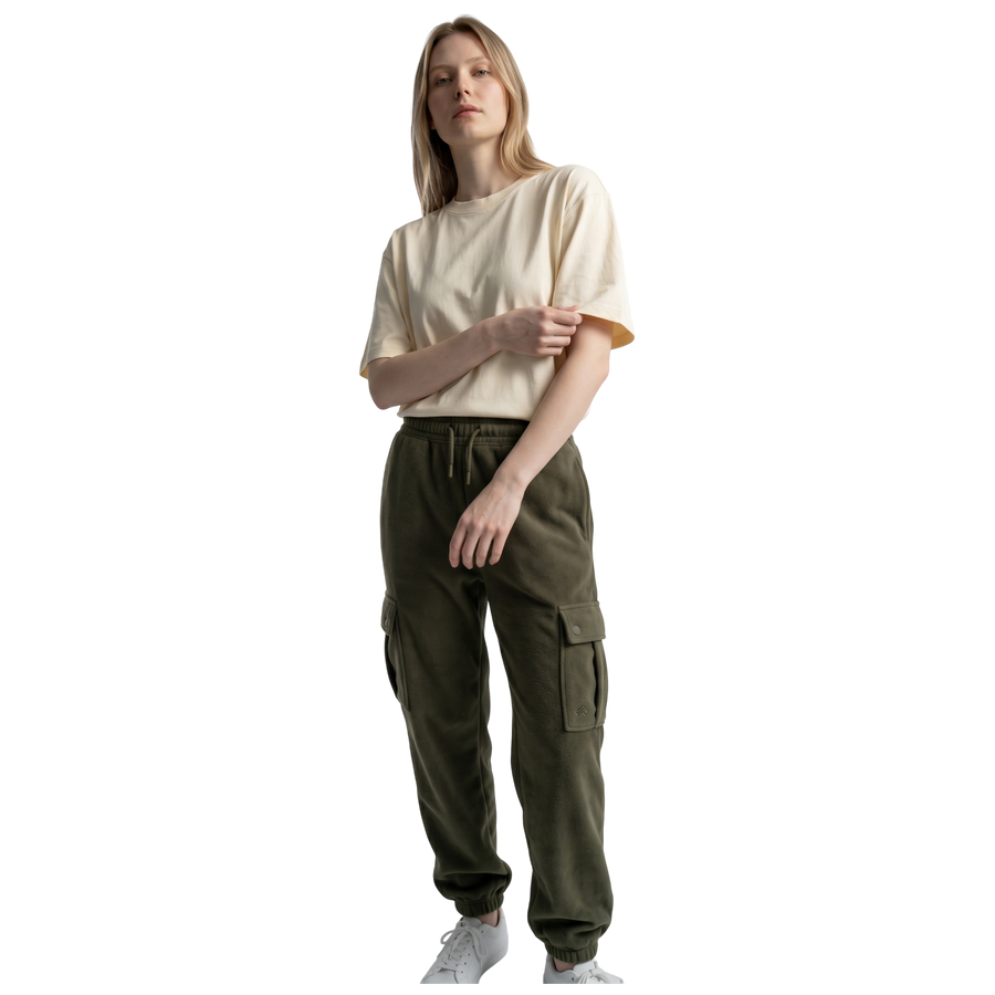 NILO Studio Heavyweight Tee in cream cotton with drop shoulders worn by a model with olive cargo joggers