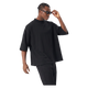 NILO Vision oversized boxy black heavyweight cotton t-shirt worn by a man with sunglasses and white sneakers